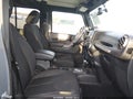 2014 Jeep Wrangler Unlimited — photo 5 of 16 | VIN 1C4BJWDG5EL311669