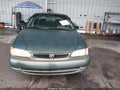2000 Toyota Corolla — photo 11 of 15 | VIN 2T1BR12E7YC373308