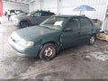 2000 Toyota Corolla — photo 2 of 15 | VIN 2T1BR12E7YC373308