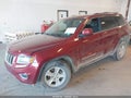 2014 Jeep Grand Cherokee — photo 2 of 16 | VIN 1C4RJFAG2EC308148