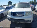 2012 Honda Pilot — photo 12 of 16 | VIN 5FNYF3H98CB008410