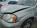 2005 Mazda Tribute — photo 13 of 16 | VIN 4F2YZ04185KM65875