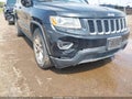 2014 Jeep Grand Cherokee — photo 6 of 16 | VIN 1C4RJEAG6EC580910