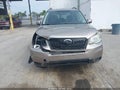2014 Subaru Forester — photo 12 of 16 | VIN JF2SJAEC9EH547762