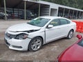 2015 Chevrolet Impala — photo 14 of 16 | VIN 1G1125S35FU143992