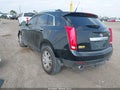 2012 Cadillac SRX — photo 3 of 11 | VIN 3GYFNAE31CS629780