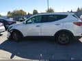 2017 Hyundai Santa Fe — photo 14 of 16 | VIN 5NMZUDLB2HH047980
