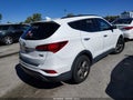 2017 Hyundai Santa Fe — photo 4 of 16 | VIN 5NMZUDLB2HH047980