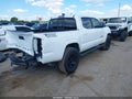 2022 Toyota Tacoma — photo 4 of 17 | VIN 3TYAX5GNXNT046099