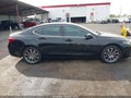 2015 Acura TLX — photo 13 of 16 | VIN 19UUB2F55FA020985