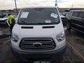 2018 Ford Transit-150 — photo 12 of 16 | VIN 1FTYE1ZM7JKB54677