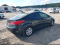 2012 Hyundai Elantra — photo 4 of 11 | VIN 5NPDH4AE7CH136578