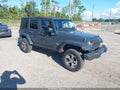 2016 Jeep Wrangler Unlimited — photo 1 of 16 | VIN 1C4BJWEGXGL261644