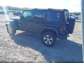 2016 Jeep Wrangler Unlimited — photo 3 of 16 | VIN 1C4BJWEGXGL261644