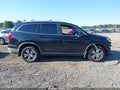 2018 Honda Pilot — photo 14 of 17 | VIN 5FNYF6H59JB018357