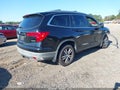 2018 Honda Pilot — photo 4 of 17 | VIN 5FNYF6H59JB018357