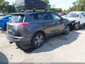 2018 Toyota RAV4 — photo 4 of 17 | VIN JTMBFREV4JJ212900