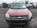 2006 Kia Sportage — photo 12 of 21 | VIN KNDJF724867198726