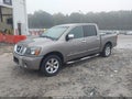 2008 Nissan Titan — photo 2 of 12 | VIN 1N6BA07DX8N343070