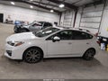 2018 Subaru Impreza — photo 14 of 17 | VIN 4S3GTAT65J3740588