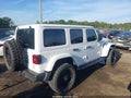 2022 Jeep Wrangler — photo 4 of 17 | VIN 1C4JJXP67NW114554
