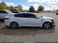 2020 Kia Optima — photo 13 of 21 | VIN 5XXGT4L30LG413817