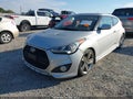 2013 Hyundai Veloster — photo 2 of 11 | VIN KMHTC6AE5DU172858