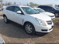 2012 Cadillac SRX — photo 1 of 16 | VIN 3GYFNAE33CS622796