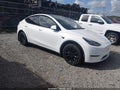 2021 Tesla Model Y — photo 1 of 15 | VIN 5YJYGDEE0MF278267
