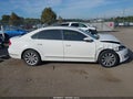 2012 Volkswagen Passat — photo 13 of 16 | VIN 1VWCH7A35CC021756