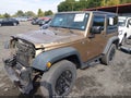 2015 Jeep Wrangler — photo 2 of 17 | VIN 1C4AJWAG7FL714344