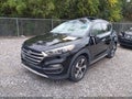 2017 Hyundai Tucson — photo 2 of 17 | VIN KM8J3CA24HU293477