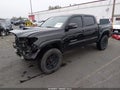 2018 Toyota Tacoma — photo 2 of 17 | VIN 3TMCZ5AN9JM182421