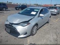 2018 Toyota Corolla — photo 2 of 16 | VIN 5YFBURHE2JP829354