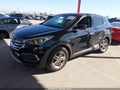 2018 Hyundai Santa Fe — photo 2 of 16 | VIN 5NMZT3LB4JH084242