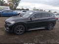 2019 BMW X1 — photo 14 of 16 | VIN WBXHT3C54K5L89639