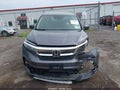 2020 Honda Pilot — photo 11 of 15 | VIN 5FNYF6H56LB039282