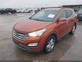 2013 Hyundai Santa Fe — photo 2 of 17 | VIN 5XYZUDLA7DG029812