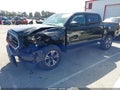 2018 Toyota Tacoma — photo 2 of 15 | VIN 5TFAX5GN4JX105079