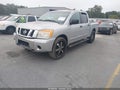 2009 Nissan Titan — photo 2 of 11 | VIN 1N6BA07D09N315232