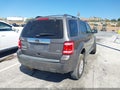 2011 Ford Escape — photo 4 of 18 | VIN 1FMCU0EG4BKB27005