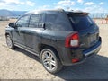 2014 Jeep Compass — photo 3 of 12 | VIN 1C4NJDCB4ED722546