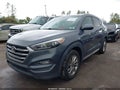 2018 Hyundai Tucson — photo 2 of 17 | VIN KM8J3CA40JU652850
