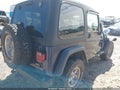 2002 Jeep Wrangler — photo 4 of 16 | VIN 1J4FA49S32P764982