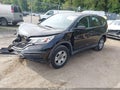 2015 Honda CR-V — photo 2 of 17 | VIN 2HKRM3H38FH535519