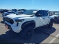 2024 Toyota Tacoma — photo 2 of 11 | VIN 3TYLC5LN6RT007042