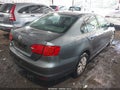 2013 Volkswagen Jetta — photo 4 of 16 | VIN 3VW1K7AJ1DM285452