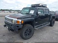 2009 Hummer H3 — photo 2 of 16 | VIN 5GNEN13L498155054