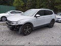 2018 Volkswagen Tiguan — photo 2 of 17 | VIN 3VV3B7AX7JM195266
