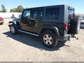 2009 Jeep Wrangler Unlimited — photo 3 of 17 | VIN 1J8GA69109L719893